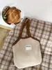 Bolsa de Camurça Coreana Feminina Grande Capacidade 2025 Nova Outono e Inverno Casual Ombro Axila Bolsa Tote para o Trabalho