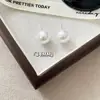 Fiebre de bloggers de Corea del Sur con pendientes de perlas vintage, temperamento femenino, pendientes de alta gama, pendientes atractivos.