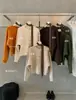 Blusa de Tricô Minimalista Estilo Coreano Y.JIA Outono Soltinha Emagrecedora Gola Redonda Manga Curta 610 (com lenço)