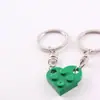 Lindo y Fresco Llavero de Amor con Puzzle de Lego Se Puede Ensamblar y Dividir Bloques de Construcción Accesorios de Llavero para Pareja Venta al Por Mayor