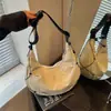 Bolso de dumplings de nicho estilo ins nuevo para mujer, bolso versátil de hombro y cruzado estilo casual universitario para mujer