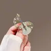 Broche único de perlas con diseño de corazón 2024 nueva moda otoño e invierno corsage accesorios de alfiler delicados para mujer Corea del Sur