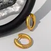 Pendientes de metal con diseño creativo para mujer, pendientes de botón para oreja, pendientes de aro, pendientes de estilo francés de lujo ligero de alta calidad, Novedad 2023