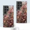 Bestseller de comercio electrónico transfronterizo: Funda rígida de cristal para Samsung S22/S23 Ultra con diseño artístico floral de polvo dorado