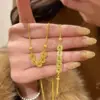 Collar de Moneda de Cinco Emperadores Triturada de Hielo Exquisito y que Atrae la Riqueza, Nunca se Desvanece, para Mujer, Diseño de Nicho con un Toque de Moda de Alta Gama