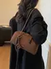 Diseño de nicho retro transfronterizo, bolso de gran capacidad para debajo del brazo, bolso tipo almohada moderno y minimalista, bolso de hombro de color liso de moda para el día a día