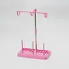 Accesorios universales para máquina de coser doméstica DIY estante de alambre de cuatro colores extraíble estante de tres hilos estante de bobinado de plástico plástico