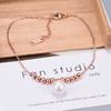 Y20 venta al por mayor cuerpo desnudo cuenta redonda colgante tobillera de perla grande tobillera de oro rosa 18K acero de titanio tobillera de acero de titanio para mujer joyería de Corea