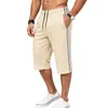 Pantalones cortos de playa de punto elástico transpirables de tres rayas para hombre, de verano, europeos y americanos, sueltos, de deporte, recortados para hombre