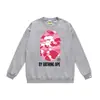 Otoño e invierno estilo japonés marca de moda cabeza de simio estampado de dibujos animados unisex joven suéter sudadera holgada venta al por mayor y dropshipping