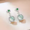 Cuenta de Video Más Vendido Grado A Natural Jade Azul Agua Aretes de Perlas Redondas Nuevo Estilo Chino Versátiles para Viajar Lujo Ligero Arete de Nicho