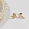 Aretes de Tuerca Geométricos de Estrella de Acero Titanio con Bolas de Acero Grandes y Pequeñas de Moda Simple al por Mayor de Fábrica de Venta Caliente Aretes Perforados Mujeres