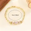 Pulsera de moda niche de diseño único de estilo ins europeo y americano con motivos de mariposa de circón y flor de hielo