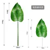 Venta caliente de Amazon hojas tropicales artificiales flores plantas verdes con césped floral decoración del hogar manualidades de plantas verdes