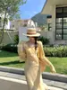 Xiu Xixi 2026 Verano Nuevo Estilo Etiqueta Blanca Elegante Manga Larga Ajustado Cardigan de Punto Chal de Protección Solar para Mujer 25671