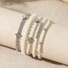 Pulseira Empilhada da Moda Nova Transfronteiriça Europeia e Americana, Conjunto de Pulseiras Cruz Estrela Pérola Imitação com Senso de Design Ins