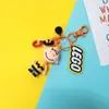 Chaveiro Cartoon Snoopy Charlie Pingente para Mochila Escolar Estudante Feminino Exquisito Fofo Criativo Casal Chaveiro de Carro