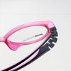 El nuevo marco de gafas ovaladas para estudiantes infantiles se puede equiparar con el número de almohadillas nasales suaves de silicona de tres puntos gafas ópticas Danyang