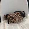 Elegante bolso cruzado de nailon casual para mujer 2026 nuevo de moda tendencia gran capacidad estampado de leopardo estilo europeo y americano bolso de cintura bolso de pecho