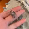 Clip de Oreja Único de Telaraña para Mujer Pendientes de Halloween Pendiente de Clip de Chica Popular Genial para Oreja Apertura Pendientes Ajustables