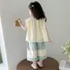 Novedad Verano 2026 Estilo Coreano Ropa Infantil para Niñas, Camisa Francesa Dulce de Encaje Calado, Camisa de Muñeca, Conjunto de Pantalones de Nueve Puntos