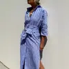 Estación independiente Amazon para mujer europea y americana nuevo cárdigan de rayas de media manga vestido camisero con solapa largo