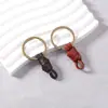 Llavero de Piel de Vaca de Primera Capa Tejido a Mano Accesorios Hechos a Mano DIY Llavero de Coche Colgante de Muñeco de Oso Pequeño Venta al por Mayor