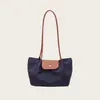 Bolsa de ombro única de cor contrastante estilo minimalista transfronteiriça couro macio leve bolsa tote fashion bolsa de bolinho versátil de alta qualidade bolsa para o dia a dia