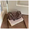 Bolso pequeño retro con patrón de diamantes transfronterizo para mujer, nuevo bolso tipo almohada de alta gama, bolso de hombro y bandolera de diseño nicho, moderno