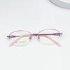 Nuevo marco medio para mujer súper elástico pierna ancha memoria marco de gafas al por mayor Ovalado diseñador aleación de titanio presbicia altura