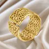Anillo Retro de Acero Inoxidable Transfronterizo para Mujer Lujo Ligero Gama Alta Textura Irregular Diseño de Nicho Anillo Hueco de Acero de Titanio