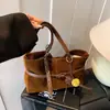 Bolso de axila estilo commuter francés para mujer Otoño e Invierno 2025 Nuevo Bolso de hombro retro de gran capacidad Bolso tote diario para el trabajo