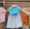Camiseta Moda Verão 2026 Feminina Manga Curta Estilosa Versátil Designer com Abertura nas Costas e Corte Justo