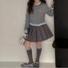 Cuhk conjunto de dos piezas para niños camisa suéter falso falda plisada conjunto de dos piezas 2025 primavera nuevo traje de estilo extranjero para niños