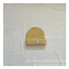 Versión coreana de gorro de punto simple estándar pequeño para niños de invierno, gorro cálido, gorro de lana para bebé, gorro para el frío, venta al por mayor
