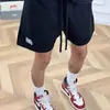 Shorts Casuales Pesados Estilo Americano Nuevos de Verano para Hombres y Mujeres, Pantalones de Cinco Puntos Bordados de Color Sólido, Pantalones de Chándal Sueltos y Versátiles