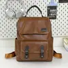 Mochila retro estilo británico con tapa abatible para pareja, adecuada para estudiantes universitarios, para llevar laptops y libros a clase, y para ir al trabajo o para viajes cortos.