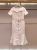 Vestido de Verano Nuevo Estilo Dulce Francés de Manga Corta de Un Solo Botón Cola de Pez de Alta Gama para Mujer en Shenzhen Nanyou