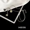 [56] logotipo de comercio exterior sin marca acero de titanio joyería Europa y Estados Unidos variedad de hip-hop apilado collar de clavícula de acero de titanio