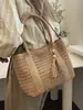 Bolsa de playa de gran capacidad para mujer, nuevo estilo verano 2025, bolso tote tejido a mano de paja casual para ir al trabajo