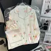 Pijama para mujer para primavera y otoño, de manga larga y pantalón largo, dulce conjunto de dos piezas tipo cárdigan de seda sintética, ropa para el hogar, venta al por mayor de fábrica