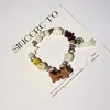 Pulsera de Cerámica Jingdezhen Nueva Historieta China Pulsera Boutique Venta al por Mayor Estudiante Joker Explosiones Puesto del Mercado Nocturno Pulsera