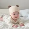 Touca de bebê para primavera e outono, fofa e super adorável, estilo coreano, touca de puxar, touca para recém-nascidos, meninos e meninas, touca quente e protetora para fontanela para bebês pequenos