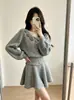 Nuevo Estilo Otoño/Invierno 2026 Suéter de Punto Ajustado con Flores Tridimensionales + Falda Conjunto de Dos Piezas Estilo Dulce para Mujer