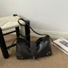 Nuevo bolso de axila vintage de otoño e invierno para mujer, bolso de hombro de cuero suave de alta gama, bolso cruzado versátil para el día a día, bolso baguette de motociclista