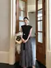 Falda Larga Elegante de Color Sólido con Diseño Plisado de Cintura Alta Adelgazante Xiu Xixi Otoño 2026 (con cinturón K81005)