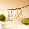 Pendientes de Verano Dopamina Estilo Vacaciones Oceánicas Transfronterizas Europeas y Americanas con Forma Irregular de Estrella de Mar, Concha y Grava de Colores