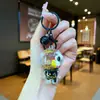 Tiktok Ouro Preto Astronauta Criativo Areia Movediça com Óleo Chaveiro Flutuante Fresco Astronauta Planeta Pingente Casal