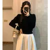 Top elegante de cuello redondo estilo coreano para primavera y otoño con mangas abullonadas y entallado en la cintura, suéter de punto liso hueco de invierno para mujer