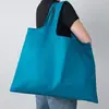 Ventas Directas de Fábrica Bolsas de Compras Plegables Publicitarias, Bolsos de Mano, Texto de Logo Imprimible, Bolsas de Protección Ambiental, Patrones Personalizables